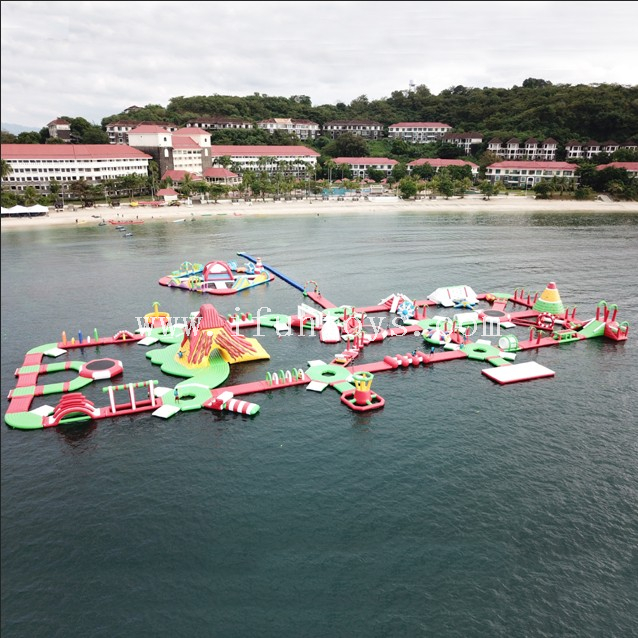 Large entertainment inflatable aqua fun floating water park in the lake / sea for a family summer